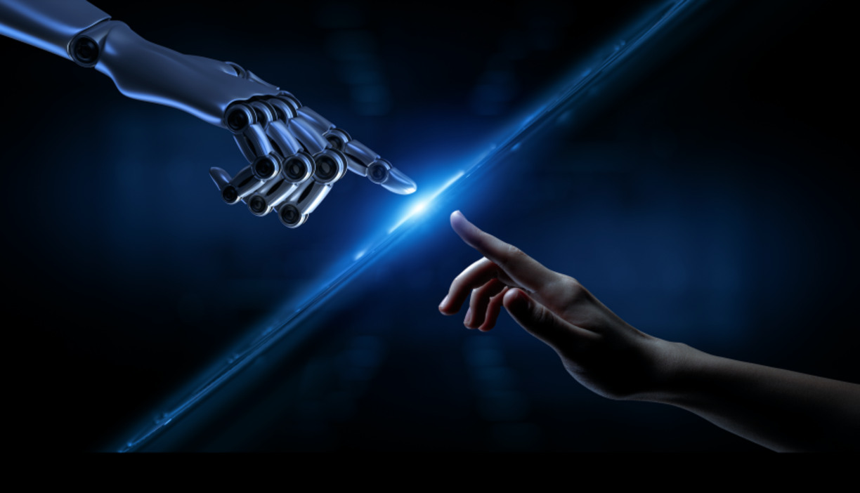 A robot hand and a human hand that both extend their index finger and should touch each other